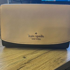 Kate Spade purse/ small bag. Never used. Peach/ tan color. Beautiful bag!